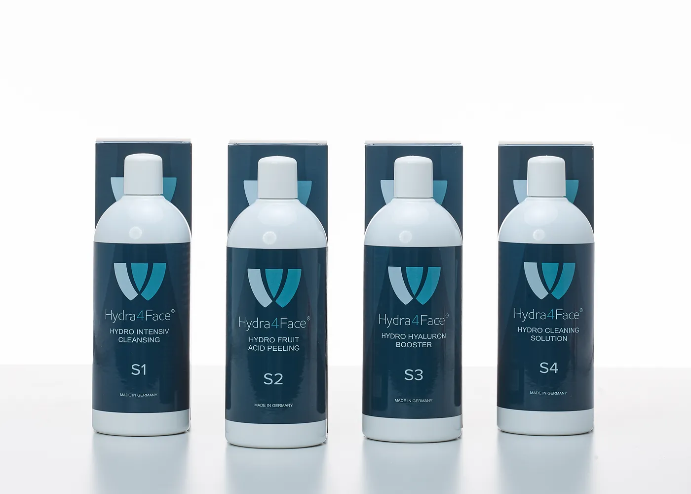 S1 bis S4, je 500 ml, vor ihren Faltschachteln, Originalfoto